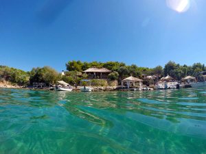 Look from the sea at Laganini bar at Palmizana