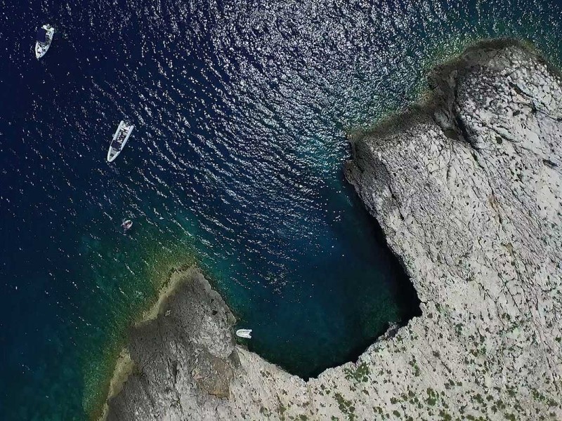 AerialViewonGreenCaveEntranceonisletravnik