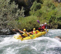 Kids excited to go down the rapids on Cetina river