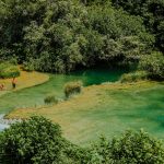 People relaxing on Krka travertine sysstem