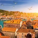 Seaguls-Trogir-rooftops-and-Ciovo