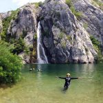 Relaxing in Cetina lake by the waterfall