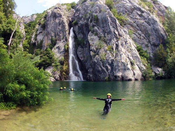 Relaxing in Cetina lake by the waterfall