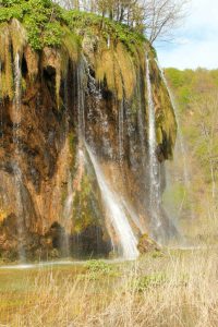 water sprinkles down the falls