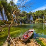 lake boat by Kravice waterfalls