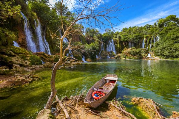 lake boat by Kravice waterfalls