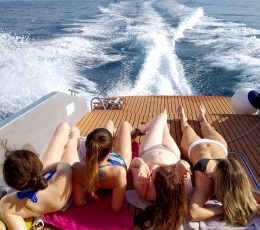 relaxing-on-speedboat-sunbathing